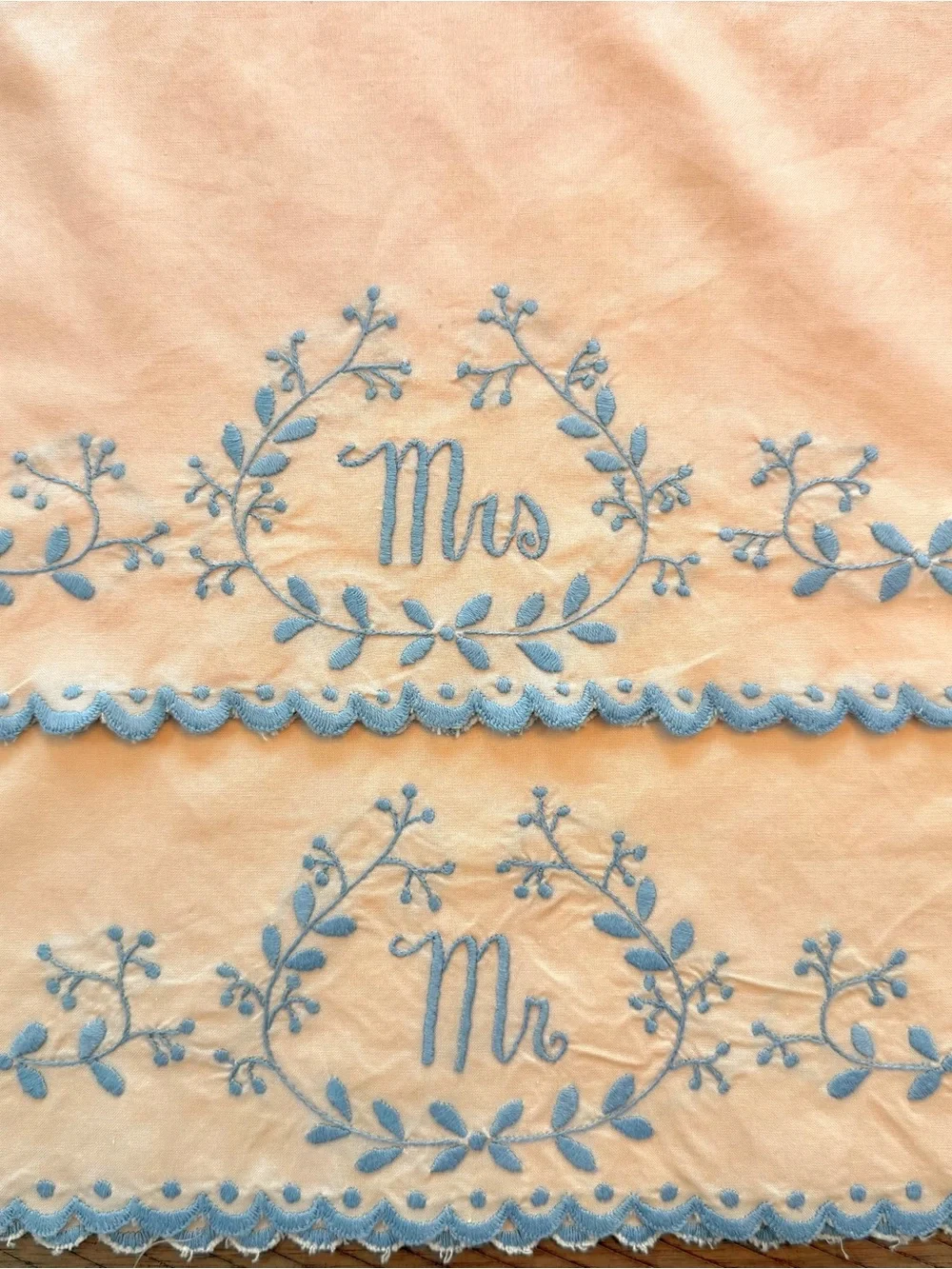 Vintage 1950’s Hand Embroidered Mr. & Mrs. Peach pillow Cases with Blue Trim
